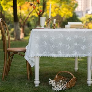 Close-up of delicate flower embroidery on 100% cotton tablecloth