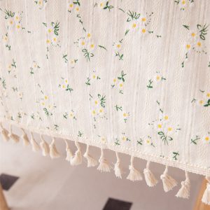 Light yellow floral tablecloth made of natural cotton for farmhouse dining