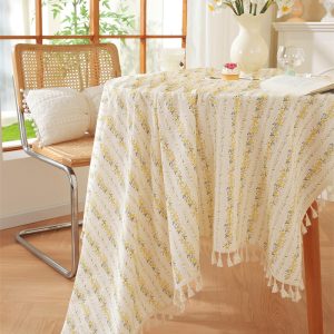 cotton tablecloth with floral print styled on a wooden dining table