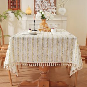 natural cotton tablecloth styled with teapot, bread, and morning light