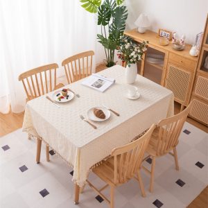 Full view of breathable 100% cotton tablecloth on wooden dining table – vintage farmhouse style