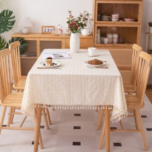 Bohemian tassel edge tablecloth on rectangular dining table – warm natural sunlight