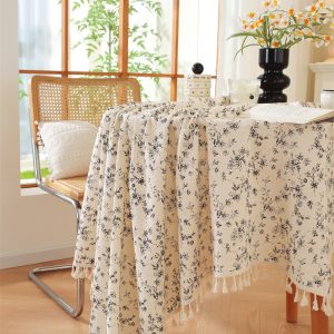 Close-up of breathable cotton fabric and detailed tassel edges