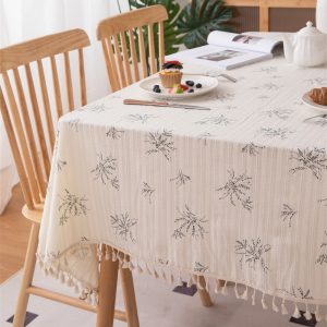 Boho farmhouse style cotton tablecloth with elegant tassels and place settings