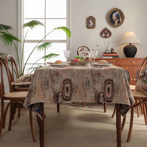 Retro-style cotton linen tablecloth with abstract jacquard design in coffee brown tones, ideal for artistic or mid-century modern dining spaces.