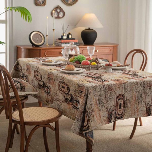 Retro-style cotton linen tablecloth with abstract jacquard design in coffee brown tones, ideal for artistic or mid-century modern dining spaces.