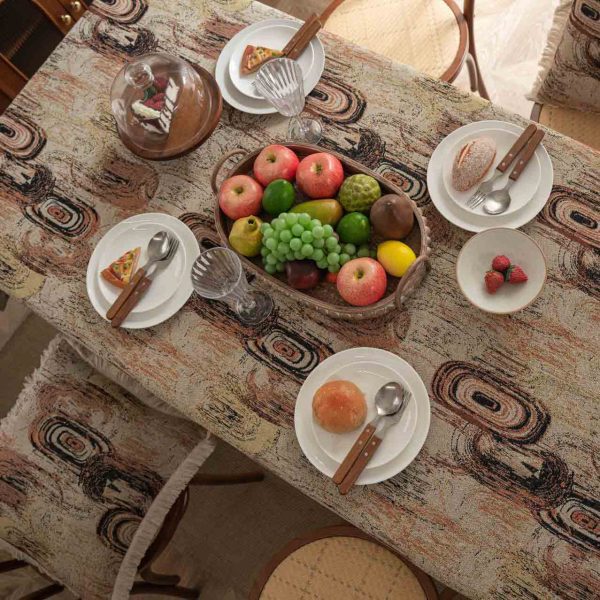 Retro-style cotton linen tablecloth with abstract jacquard design in coffee brown tones, ideal for artistic or mid-century modern dining spaces.