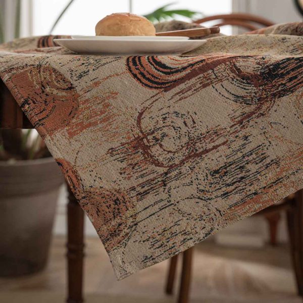 Retro-style cotton linen tablecloth with abstract jacquard design in coffee brown tones, ideal for artistic or mid-century modern dining spaces.