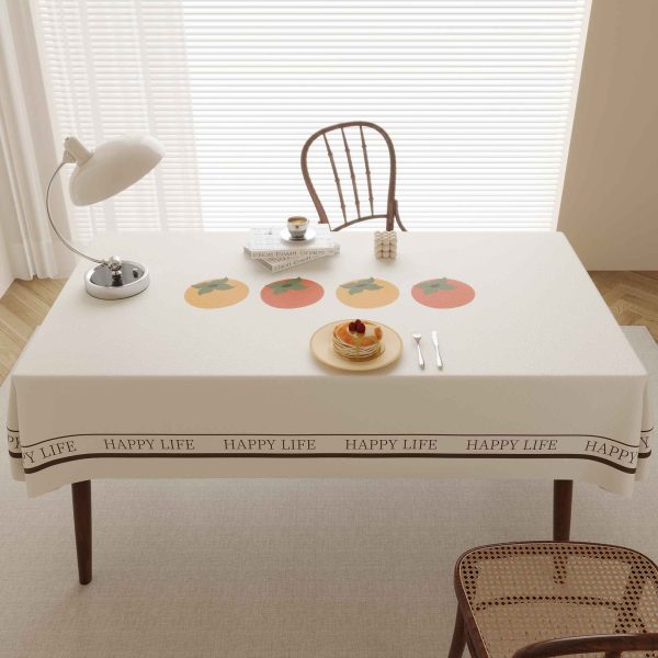 Faux leather tablecloth with persimmon pattern and “HAPPY LIFE” message, designed for easy maintenance and a stylish dining experience.