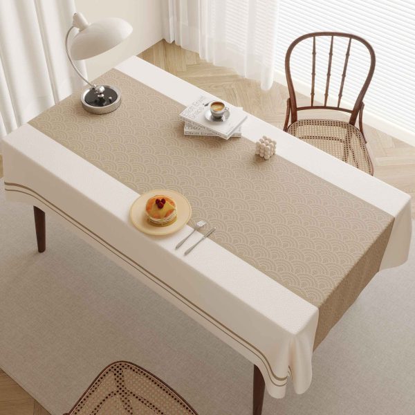 Versatile Beige tablecloth used in cozy indoor setting with soft lighting