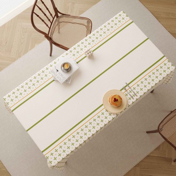 Oilcloth tablecloth styled for outdoor picnic setup with rustic vibes