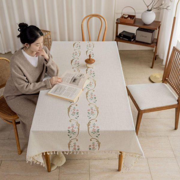 Classic white tablecloth with pink orchid flowers for farmhouse decor