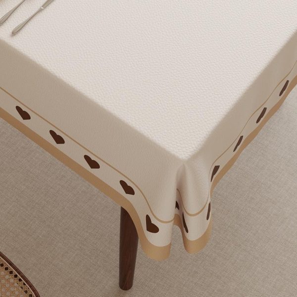 Beige faux leather waterproof tablecloth, oil-resistant, wipeable for both indoor and outdoor use.