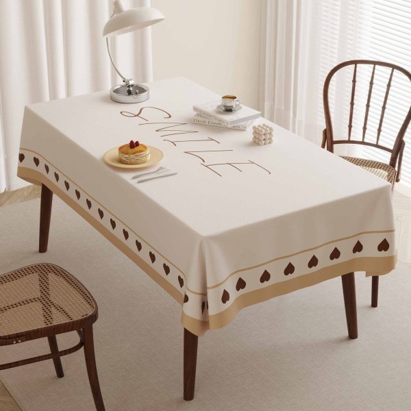 Beige faux leather waterproof tablecloth, oil-resistant, wipeable for both indoor and outdoor use.