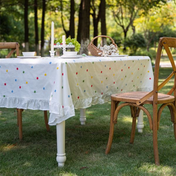 Cotton embroidered tablecloth with colorful floral embroidery and lace edging, ideal for home dining, special occasions, and outdoor gatherings. Soft cotton material with elegant design.