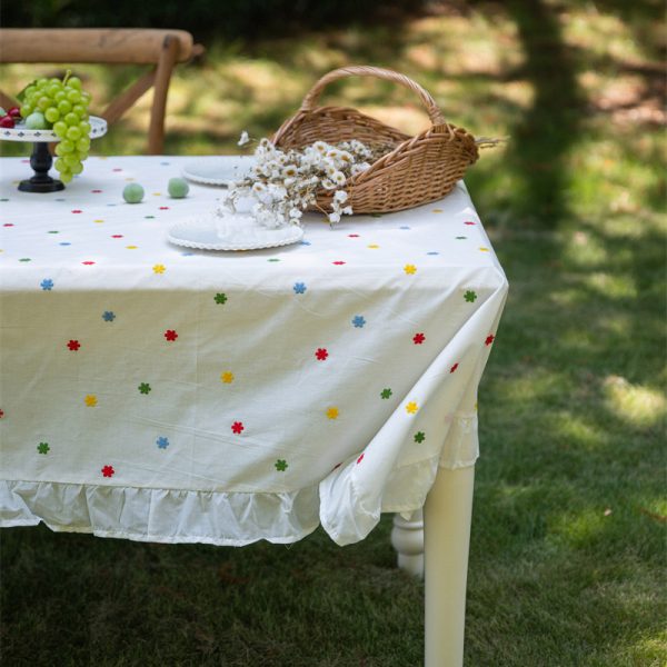 Cotton embroidered tablecloth with colorful floral embroidery and lace edging, ideal for home dining, special occasions, and outdoor gatherings. Soft cotton material with elegant design.