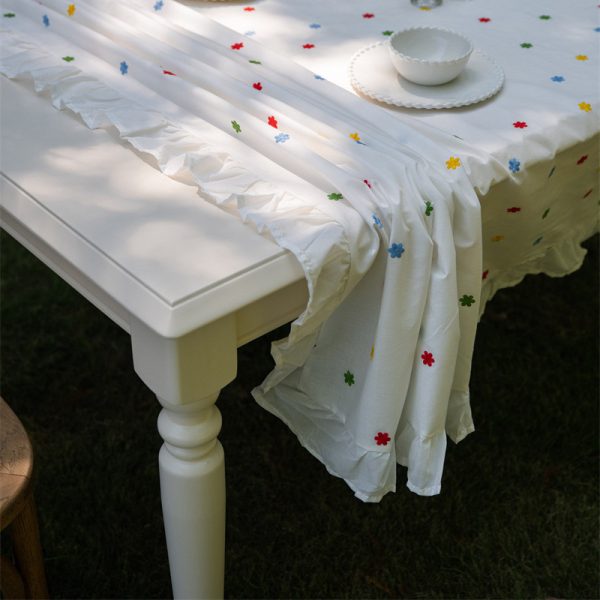 Cotton embroidered tablecloth with colorful floral embroidery and lace edging, ideal for home dining, special occasions, and outdoor gatherings. Soft cotton material with elegant design.