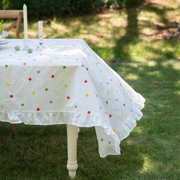 Cotton embroidered tablecloth with colorful floral embroidery and lace edging, ideal for home dining, special occasions, and outdoor gatherings. Soft cotton material with elegant design.