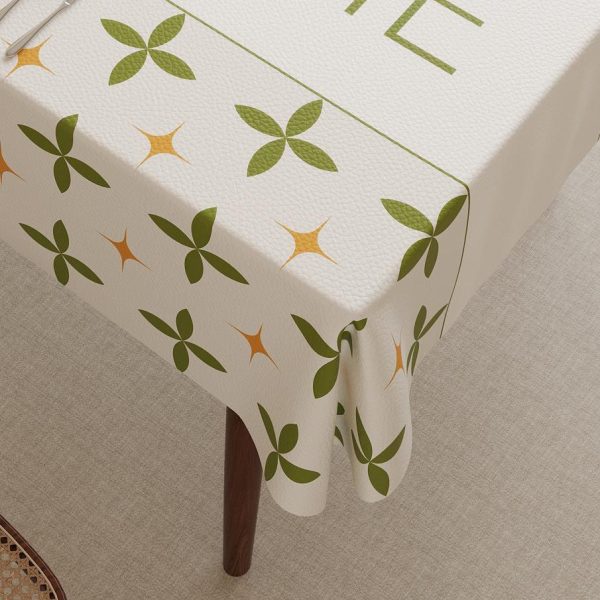 Faux leather beige floral tablecloth with "HAPPY HOME" message, perfect for indoor and outdoor dining.