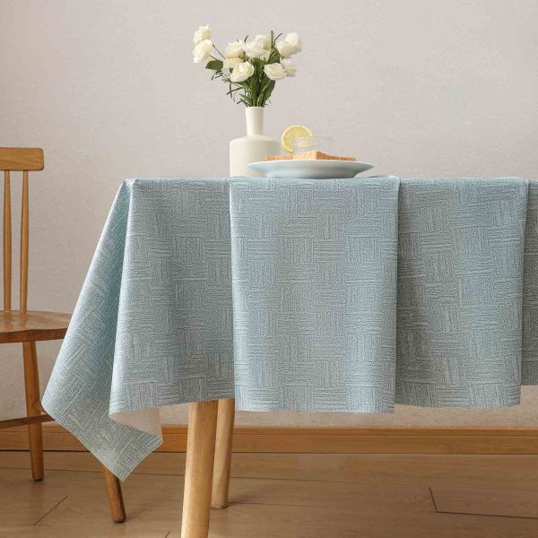 Blue geometric waterproof tablecloth made from durable PVC, perfect for indoor dining or outdoor patio use with easy wipe-clean design.
