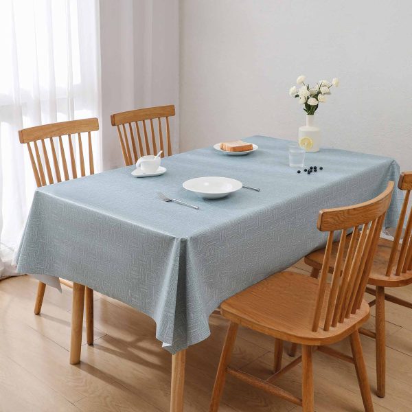 Blue geometric waterproof tablecloth made from durable PVC, perfect for indoor dining or outdoor patio use with easy wipe-clean design.