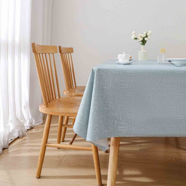 Blue geometric waterproof tablecloth made from durable PVC, perfect for indoor dining or outdoor patio use with easy wipe-clean design.