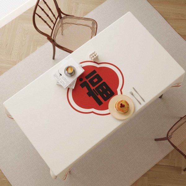 Faux leather tablecloth with red "Fu" character design, perfect for bringing good fortune and style to your dining table.