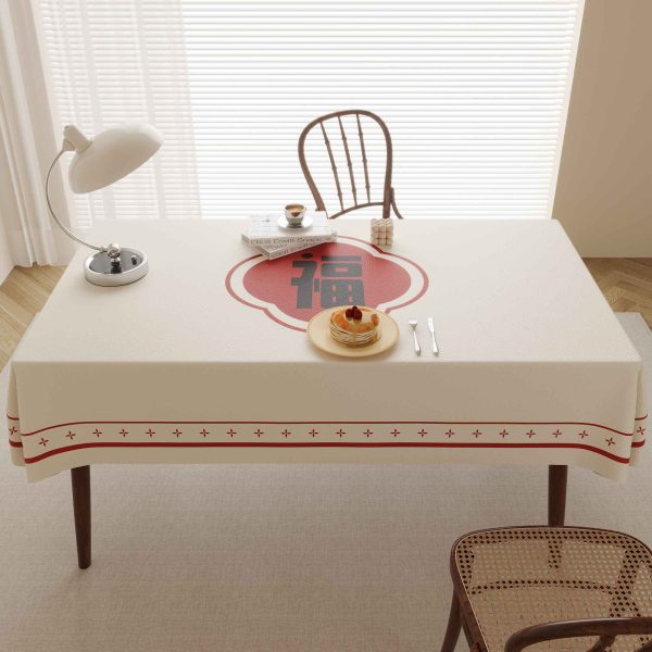 Faux leather tablecloth with red "Fu" character design, perfect for bringing good fortune and style to your dining table.