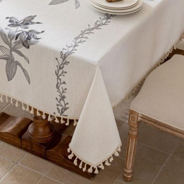 Lightweight white tablecloth with intricate floral design, styled for a home brunch