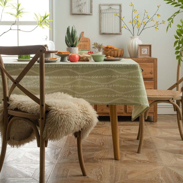 Olive green cotton-linen tablecloth with floral stripe pattern, rustic Nordic style, soft breathable fabric for home dining or café use.