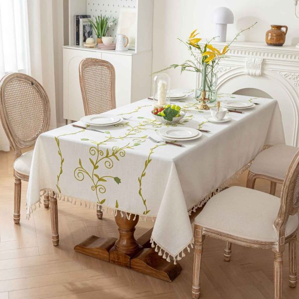 Rectangular white tablecloth with subtle green embroidery for home or restaurant use
