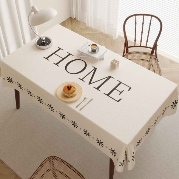 Rectangle table with Nordic-style waterproof tablecloth set for a cozy family meal