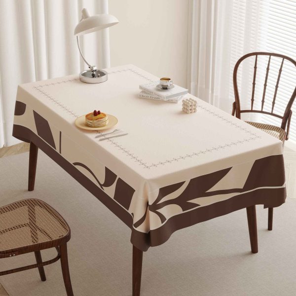 Modern Beige faux leather tablecloth with brown abstract geometric pattern on rectangular dining table