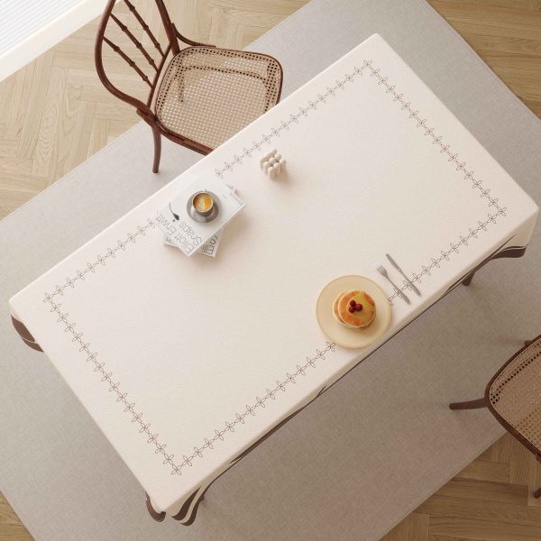 Close-up of wipeable tablecloth fabric with minimalist Nordic design