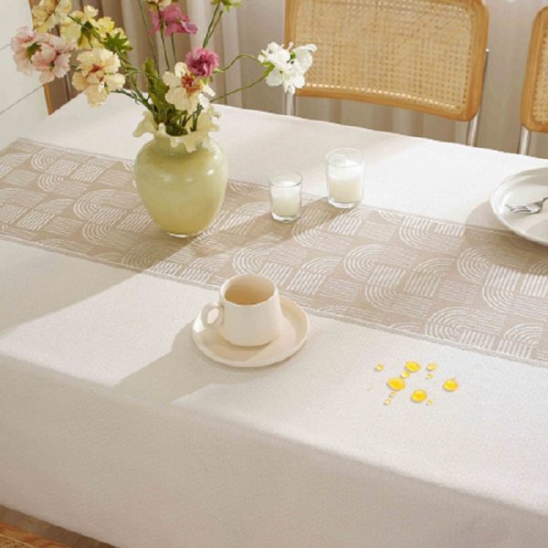 Waterproof fitted picnic table cloth featuring modern geometric pattern outdoors