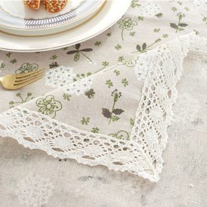 Close-up of breathable cotton-blend fabric and detailed stitching on tablecloth