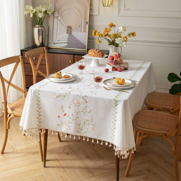 Oval waterproof tablecloth with pink flowers and wipeable surface for kitchen use
