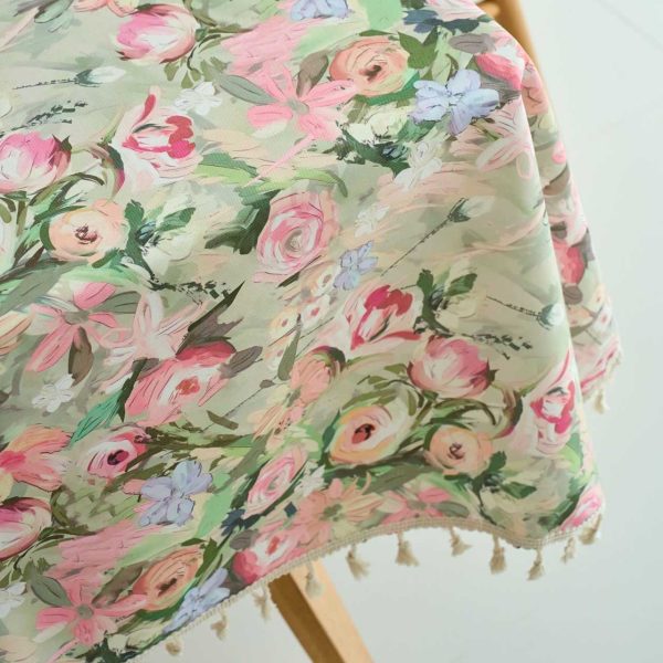 Close-up of romantic pink flower pattern on soft polyester tablecloth fabric