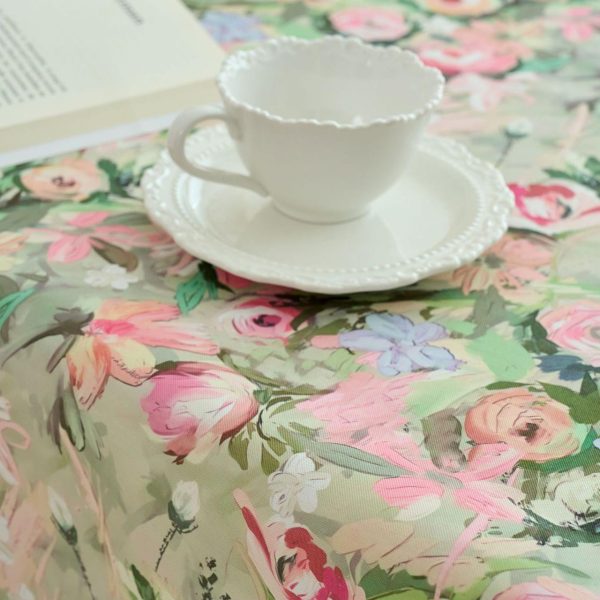 Wrinkle-resistant pink floral tablecloth styled for a cozy brunch setting