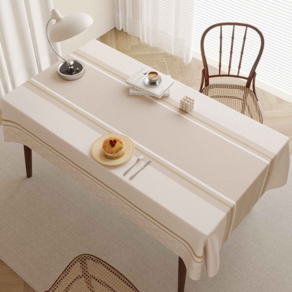 Elegant faux leather tablecloth with wave and stripe pattern, ideal for stylish and practical dining.
