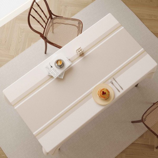 Elegant faux leather tablecloth with wave and stripe pattern, ideal for stylish and practical dining.