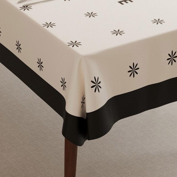 Beige faux leather tablecloth with black border and star pattern, ideal for home, outdoor, and restaurant use.