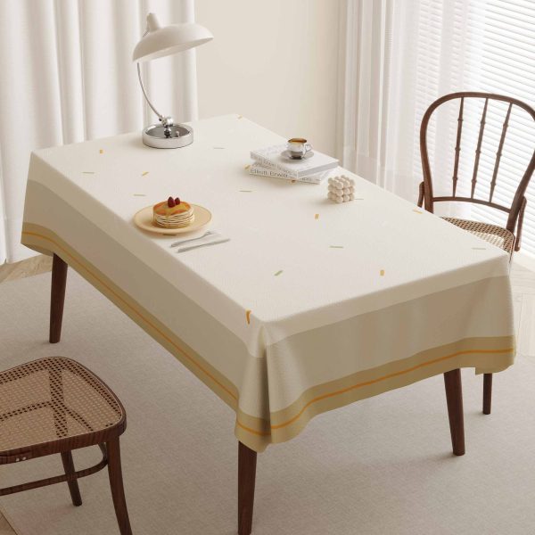 Minimalist Scandinavian-style tablecloth with durable waterproof tablecloth material and modern dot accent for home dining.