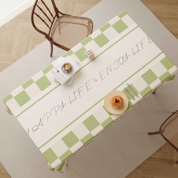 Elegant faux leather waterproof tablecloth with green checkered design and ENJOY LIFE message, perfect for modern homes and outdoor dining.