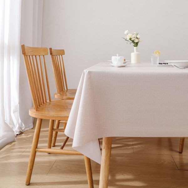 Beige geometric waterproof tablecloth made from PVC, oil-resistant and wipeable for indoor and outdoor dining settings.