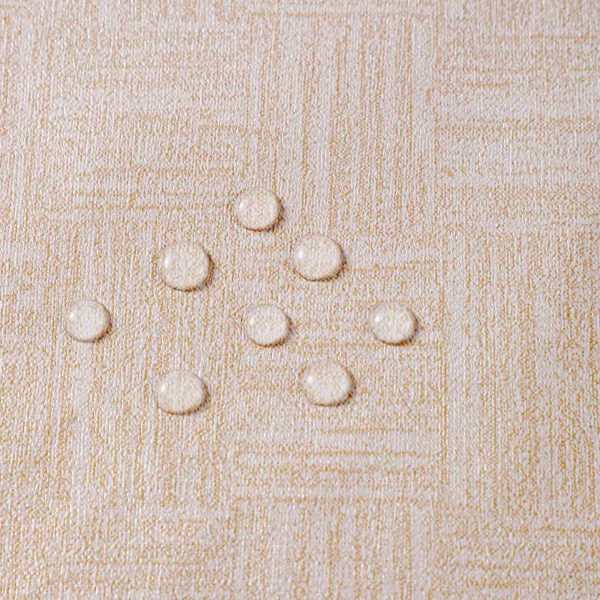 Beige geometric waterproof tablecloth made from PVC, oil-resistant and wipeable for indoor and outdoor dining settings.