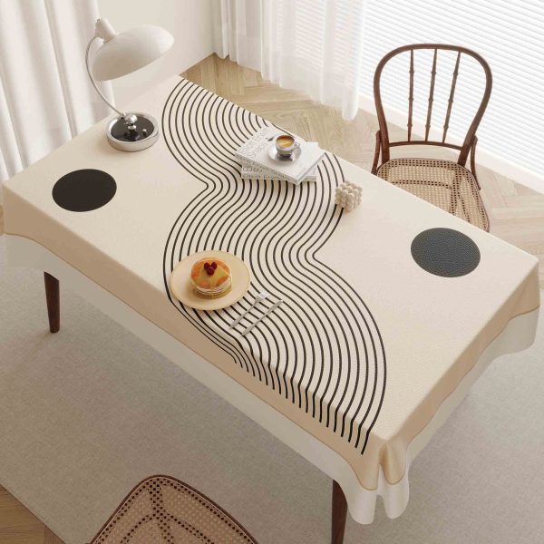 Beige faux leather waterproof tablecloth, ideal for indoor and outdoor use, with a stylish wave pattern.
