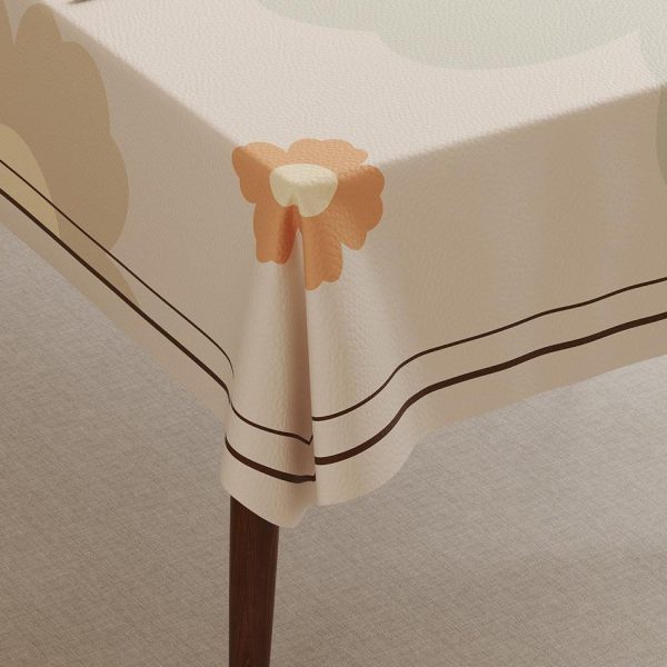 Faux leather tablecloth with floral pattern and waterproof features, perfect for modern homes and outdoor settings.