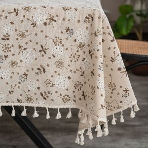 Country-style vintage linen tablecloth with delicate flowers