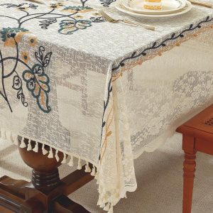 Close-up of flower embroidery on cotton-linen vintage tablecloth